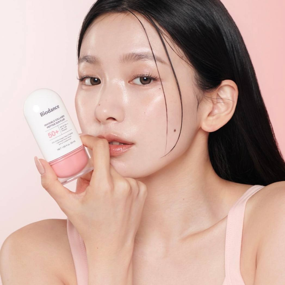 Лёгкий солнцезащитный флюид с коллагеном и пептидами SPF50+